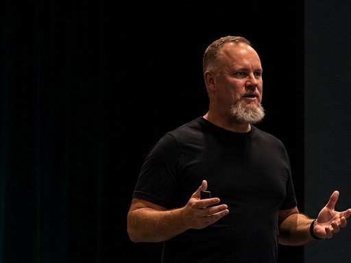 Chris Hunter speaking on stage